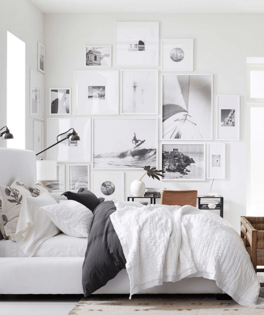 Modern Gallery Wall Bedroom Decor Idea. arrange art with different sizes and shapes in a salon style arrangement on a bedroom wall for a modern look, minimalist, transitional, coastal, girls bedroom, surf, beach house, dorm room.