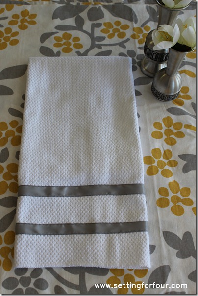 Make these pretty DIY Ribbon Trimmed Kitchen Towels! Decorate your kitchen with these quick and easy tea towels. Tutorial and supply list included. Great gift idea too!