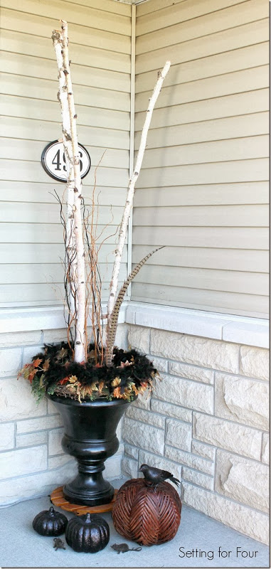 Birch filled urns and pumpkin decor - see all five porch decor ideas for fall and Halloween!