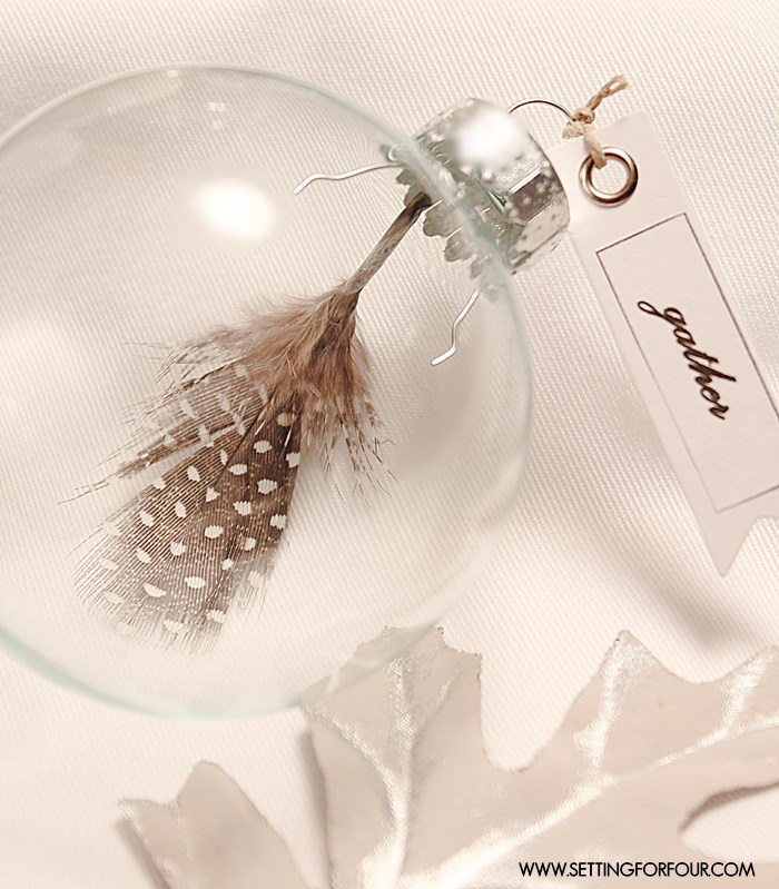 Make these DIY Feather Place Card Holders, they're so easy to whip up - great gift idea or gift topper! | www.settingforfour.com