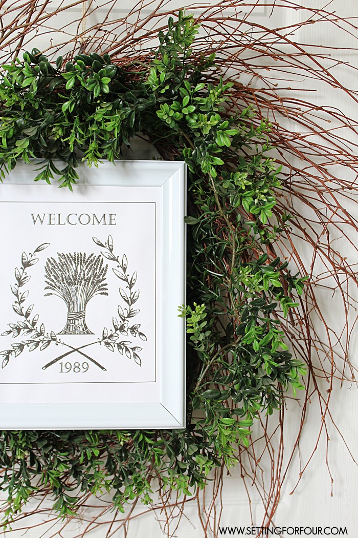 DIY boxwood wreath with a framed WELCOME printable - beautiful way to dress up your front door!