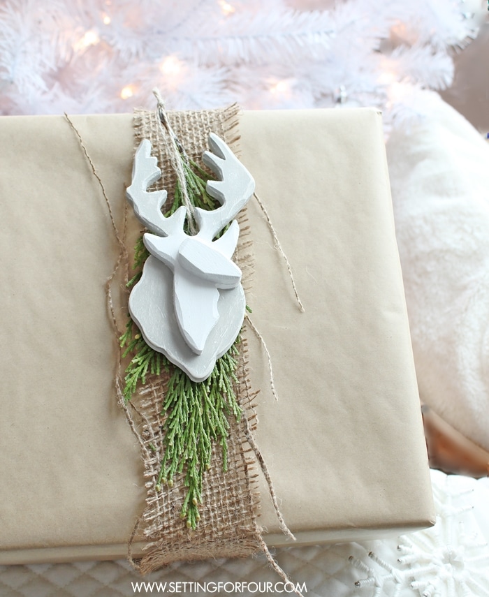 DIY Deer Ornament with a Scandinavian look! Hang it on a Christmas tree or use it as a holiday present topper when wrapping gifts!