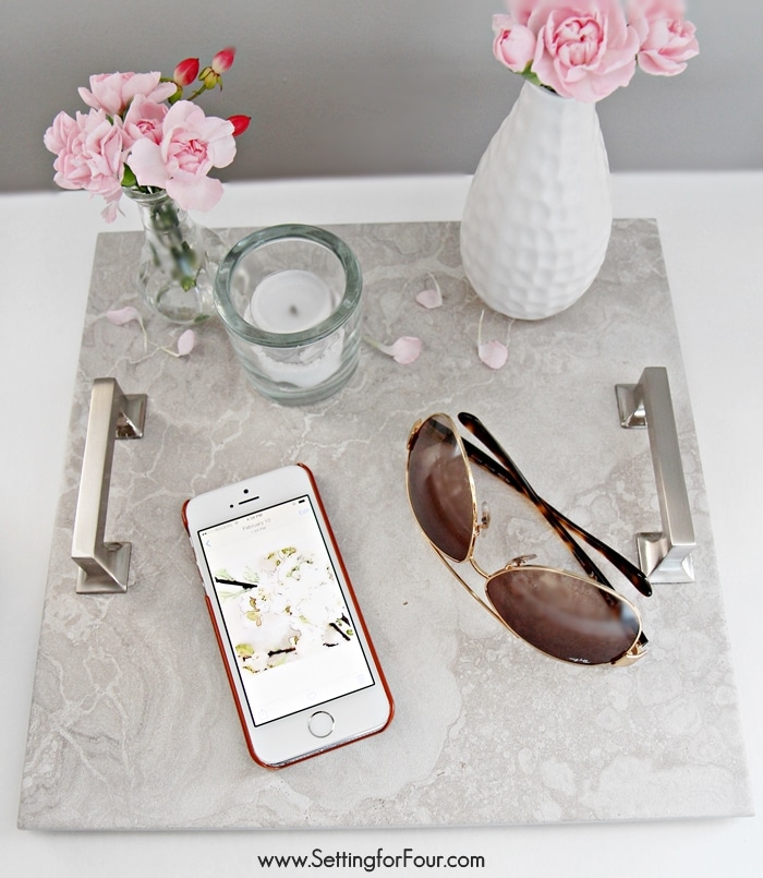 This is such a clever OUT OF THE BOX diy decor idea! See this easy DIY Tray tutorial to learn how to make a beautiful tray using gorgeous cabinet hardware and floor tile. Use for storage and display!