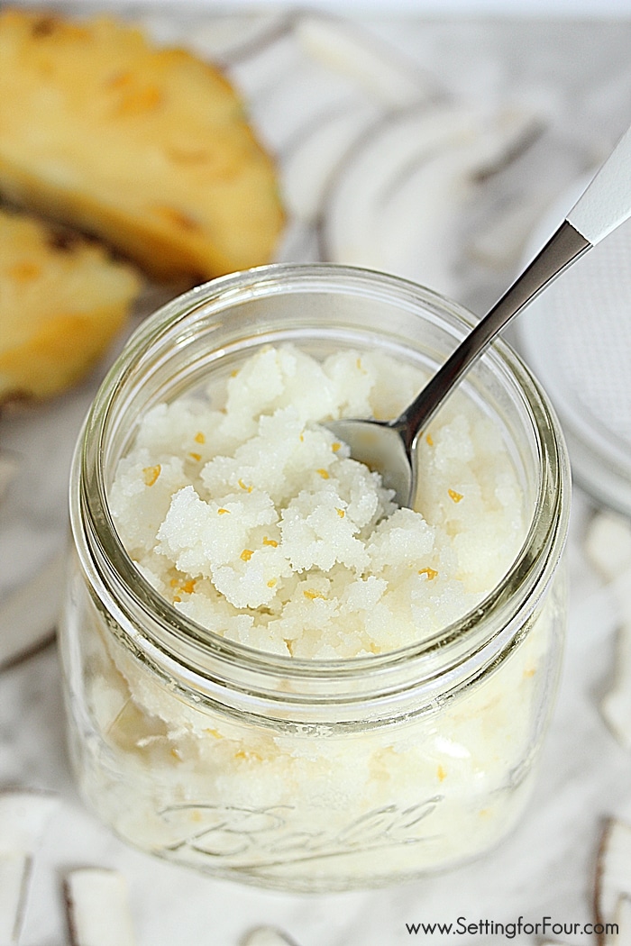 This EASY DIY Pina Colada Coconut Sugar Scrub Recipe will transport you to the tropics with the scent of pineapple and coconuts! It's a FABULOUS way to moisturize and get rid of dry flaky skin! Great gift idea! www.settingforfour.com