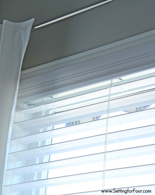 Family Room window treatment makeover with double bevel edge horizontal blinds