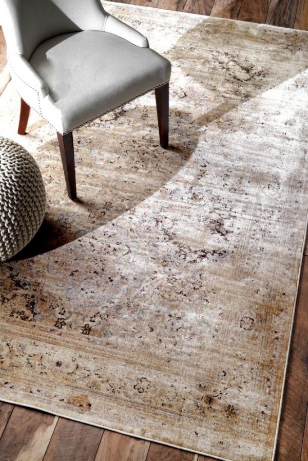 Design Tip How to Choose the Perfect Area Rug Setting For Four Interiors