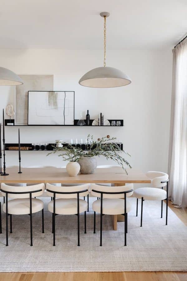 Neutral Dining Room Decor and Design Ideas. dining room rug, dining table, dining chairs, dining room lighting ideas, white walls, wall shelf decor, modern classy, modern ideas, black and white, wall art, minimalist, organic modern, transitional, farmhouse style ideas