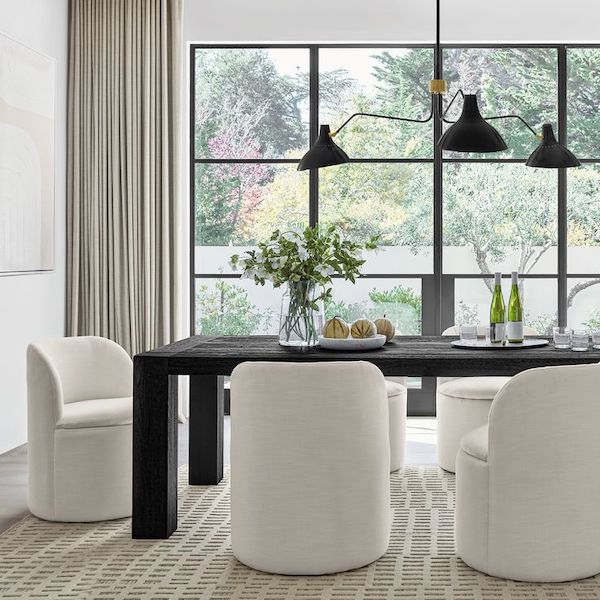 How to Choose the Perfect Area Rug For Your Dining Room. rug size, color and pattern tips, modern organic, transitional, farmhouse, minimalist, cozy, elegant dining room, barrel dining room chairs, swivel dining room chairs, black wood dining table, modern dining room pendant light