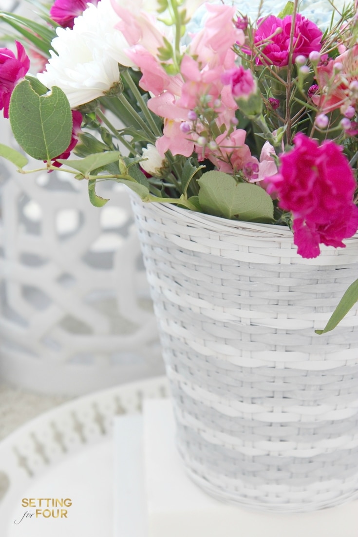 How to decorate your home with style on a budget! Give a dated $3.99 thrift store basket a chic West Elm makeover. West Elm Hack - Striped Basket Makeover.