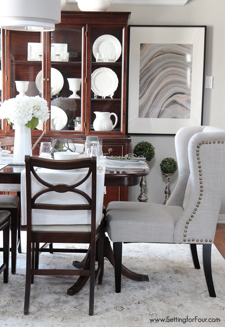 Dining room decor update. New chairs, dinnerware and textiles transform my space! www.settingforfour.com