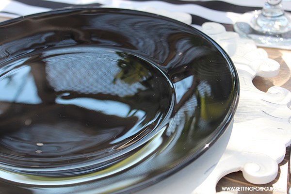 How to paint GLAM black glass plates the easy and inexpensive way- dishwasher safe too! See the trick I used so you can safely eat off of these plates! These can be so expensive to buy at boutique decor stores. Have fun making them for yourself at a fraction of the cost! www.settingforfour.com