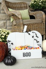 Make this beautiful DIY wood pumpkin for your front porch! DIY tutorial included. Use it to hold candy, little pumpkins or plants!