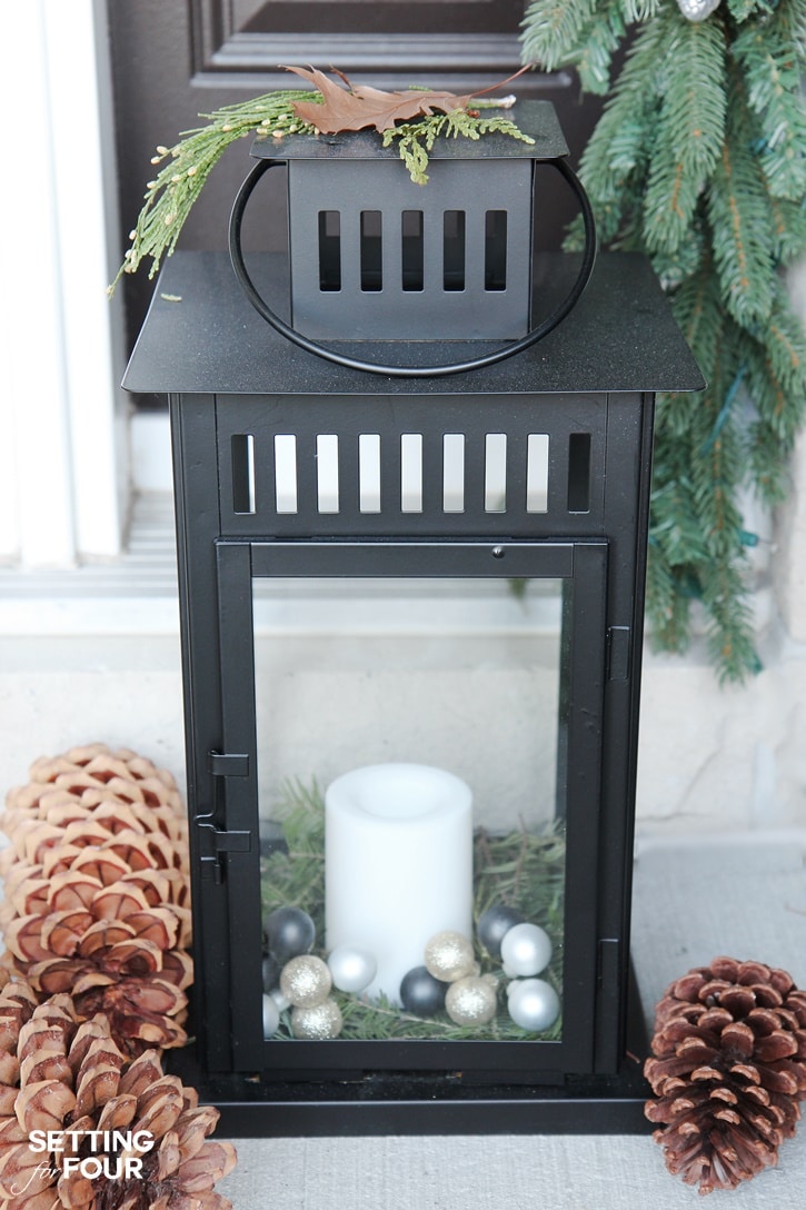 10 minute Holiday Home Decor Idea: How to decorate lanterns for Christmas. I display mine on my holiday porch!