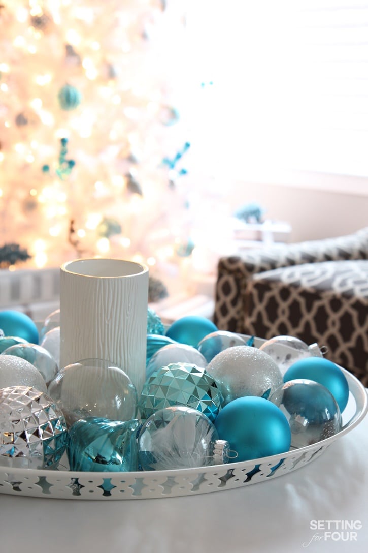 See how you can decorate your home for the holidays  in just 10 minutes with this beautiful Christmas centerpiece tray! I'll show you step by step how to display your favorite Christmas ornaments in a pretty way where there is no Christmas tree required! This Christmas display is such a fabulous festive way to decorate your coffee table, foyer table, dining table or kitchen island in record time. 