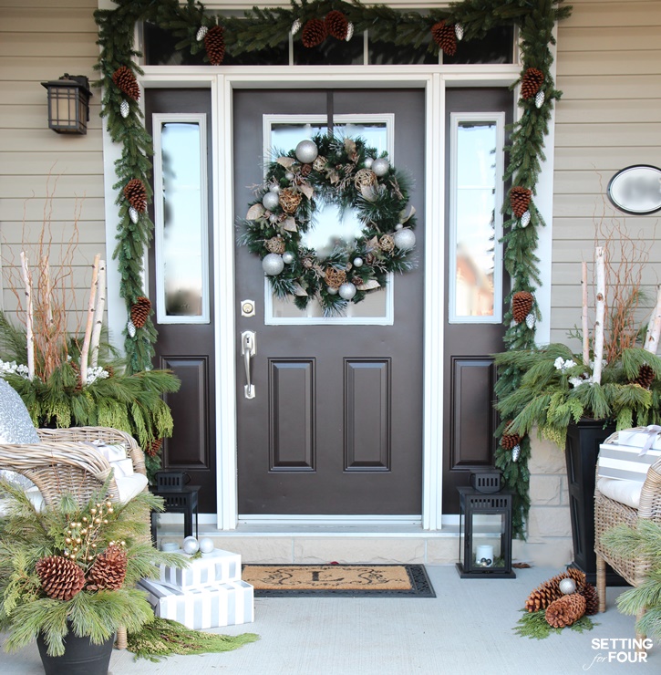 Come see all of my Holiday Cheer Outdoor Christmas Decorations and Christmas Entryway Home Tour. I show you how I love to add holiday curb appeal to my home with planters, wreaths and garland! www.settingforfour.com