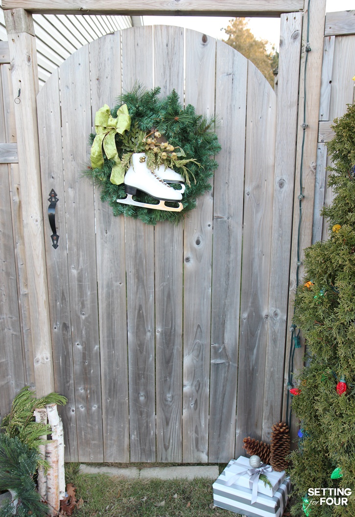 Learn how to make this easy, beautiful DIY ice skate wreath to add festive decor to your home for Christmas and winter! Adds curb appeal to your front door for the holidays!