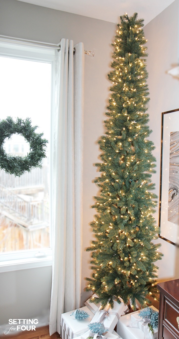 Aa PENCIL CHRISTMAS TREEa Pencil Christmas Tree is the perfect holiday solution for decorating narrow spaces like foyers, hallways and corners! Come see mine at www.settingforfour.com.