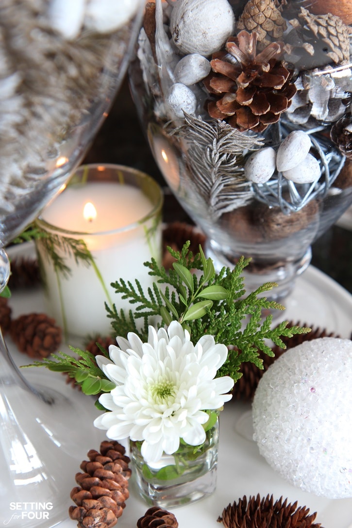 Decorate your kitchen in a jiffy with a beautiful centerpiece using apothecary jars! Apothecary jars filled with seasonal vase fillers are an easy and inexpensive way to add color and accessorize a neutral kitchen. 