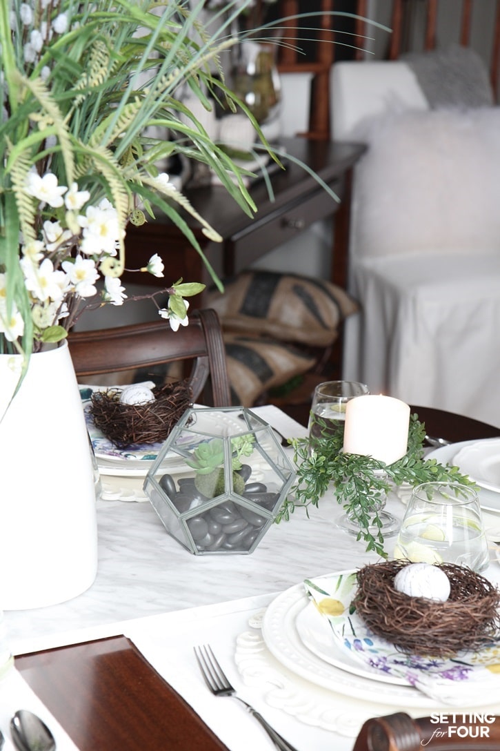 Boxwood, terrariums and nests are a great way to add spring to your table! www.settingforfour.com