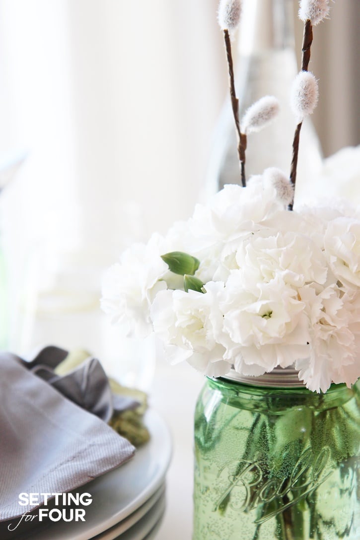 10 Minute DIY Mason Jar floral arrangement: beautiful Mother's Day gift and hostess gift idea. See my trick on using faux pussy willow branches so that they don't fall apart in water!