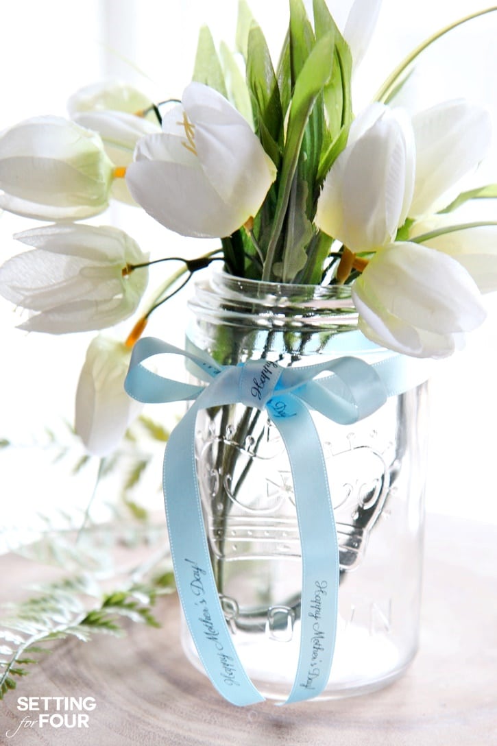 Print ribbon like this yourself -for wedding table centerpieces adding the bride and groom's name and wedding date on the ribbon. What a stunning way to personalize a wedding or party tablescape!