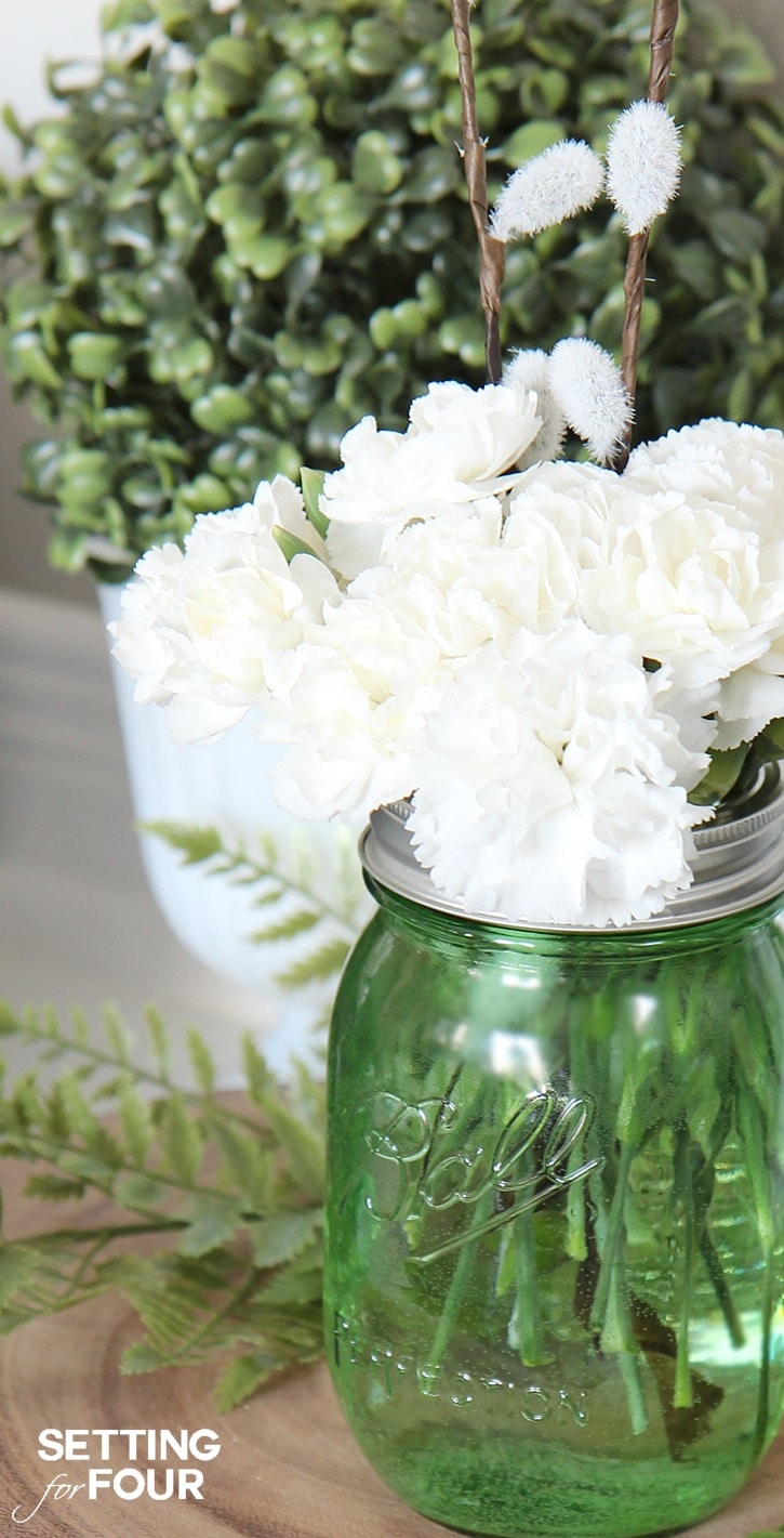 10 Minute Mason Jar Craft Idea: See my budget saving secret to making these gorgeous diy green mason jar centerpiece!