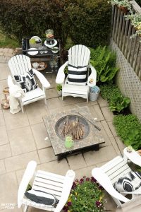 See my outdoor fire pit seating area, the DIY Adirondack chairs my family loves to relax in, outdoor bar cart and simple outdoor summer decorating ideas!