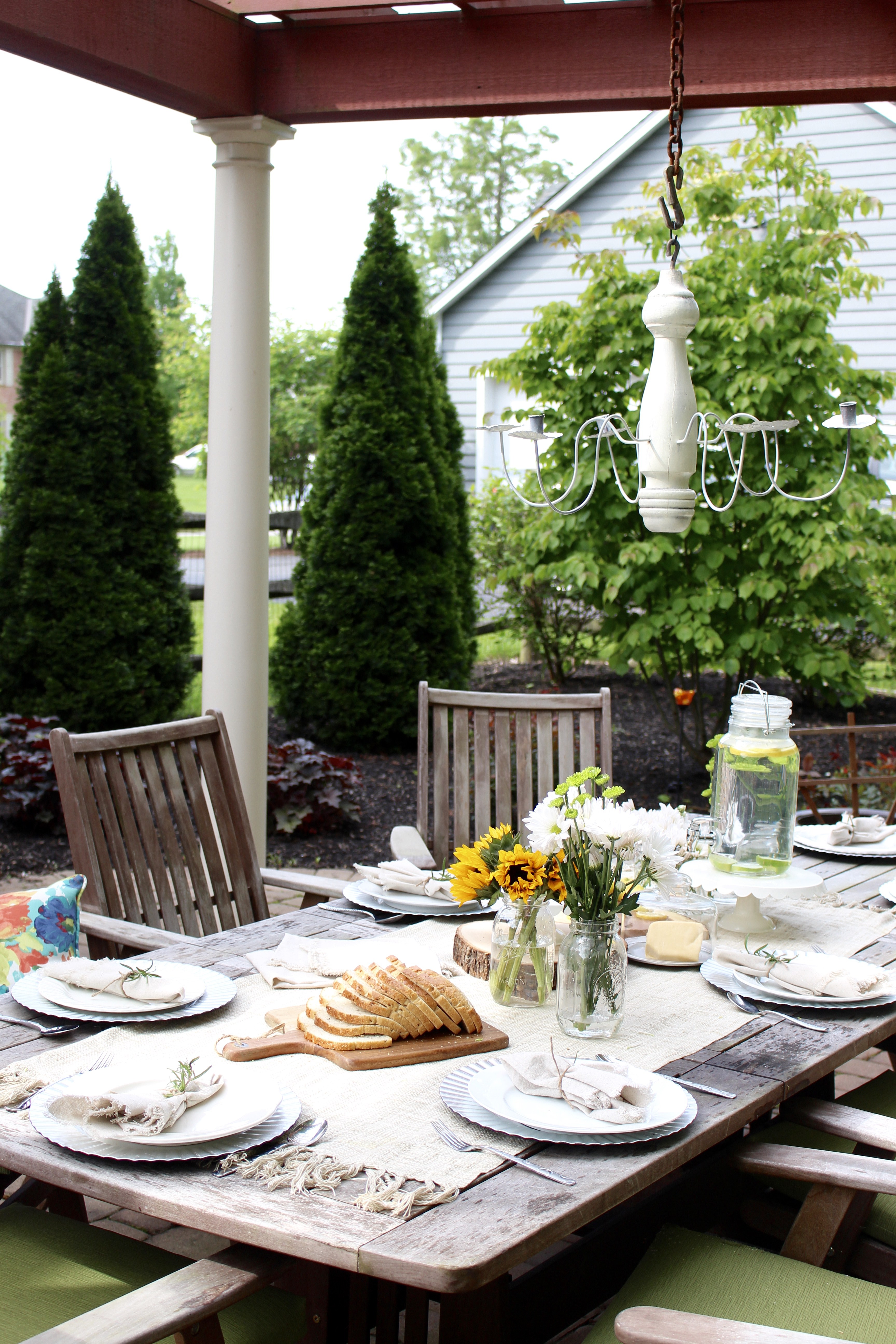 Wrap cloth napkins with summery twine and fresh rosemary: Summer Patio Refresh 