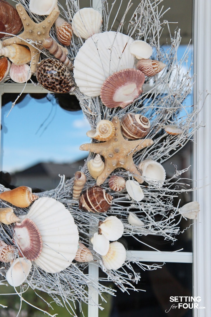 A shell wreath welcomes guests to your home and adds curb appeal!