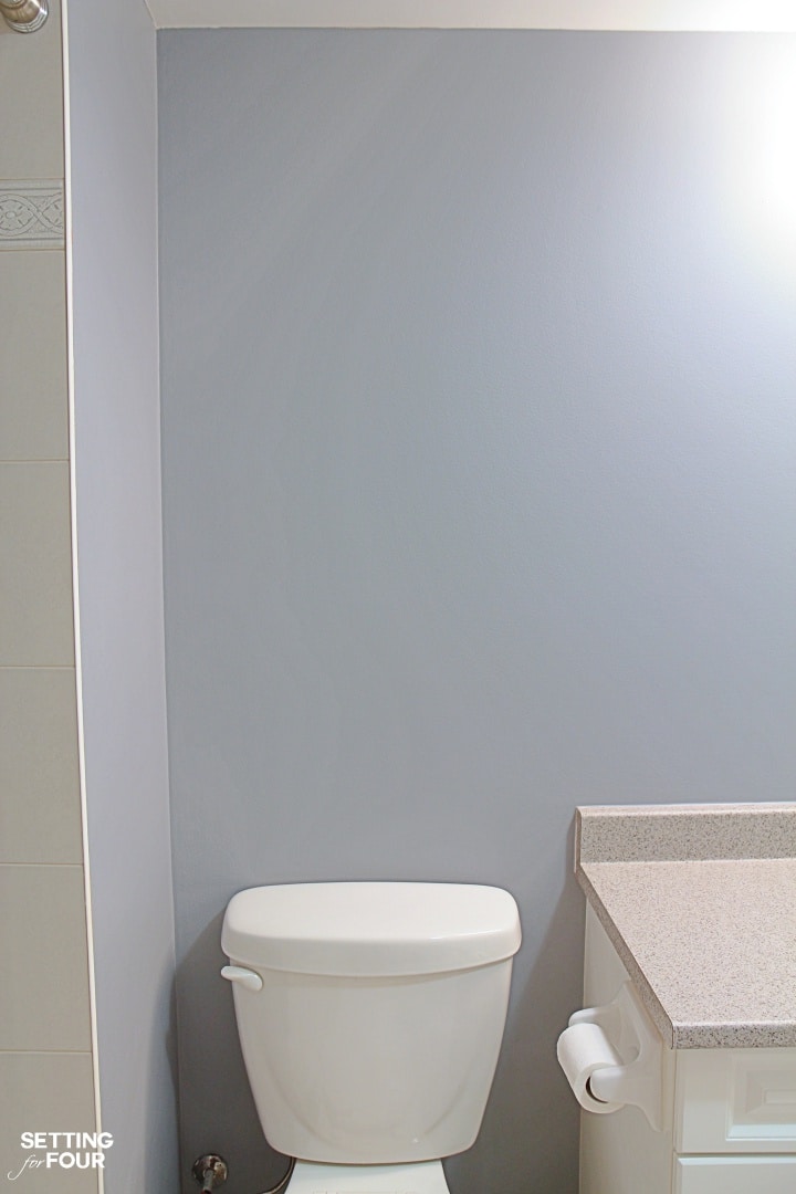 How to decorate that weird space above the toilet.