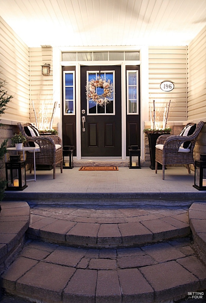 See how to add curb appeal to your home at night by adding lights to urns and lanterns.