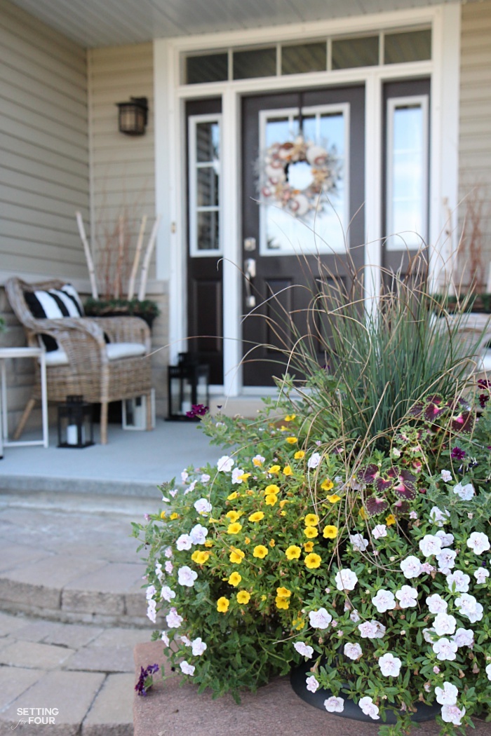 Adding a urn of flowers to your porch adds great curb appeal!