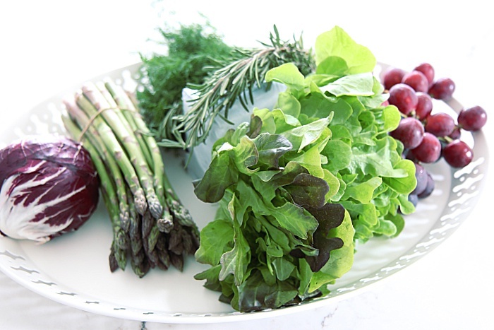 DIY centerpiece using fresh fruit, vegetables and herbs.