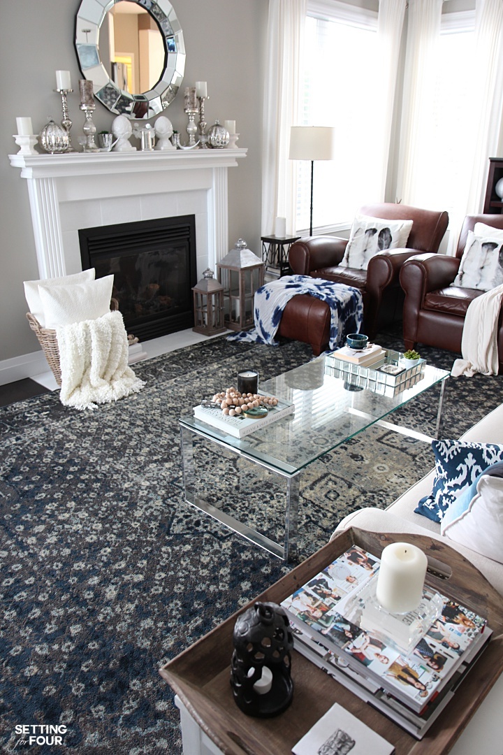 Gray, blue and cream are beautiful colors to accent brown leather furniture.