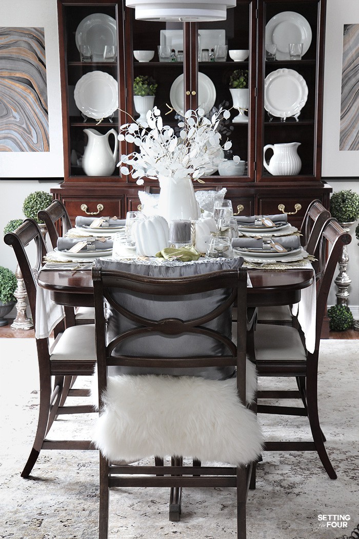 Dining room decorated for a Thanksgiving dinner party. Elegant and easy decor ideas. #centerpiece #thanksgiving #diningroom #decor #fall #party 