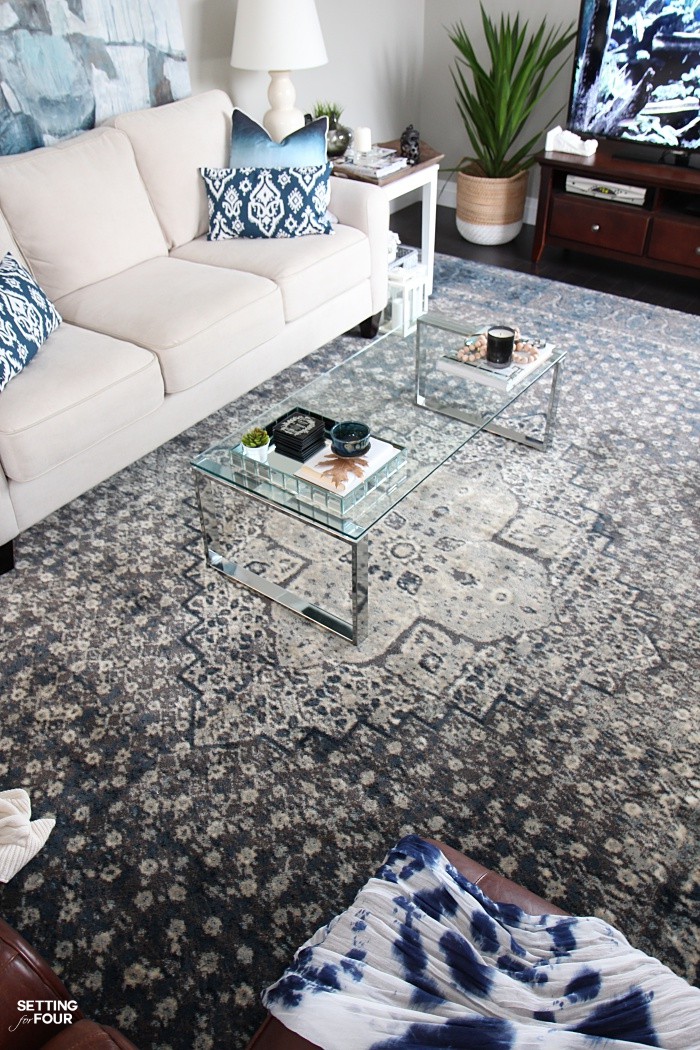 Living room decor in indigo blue, gray and cream.