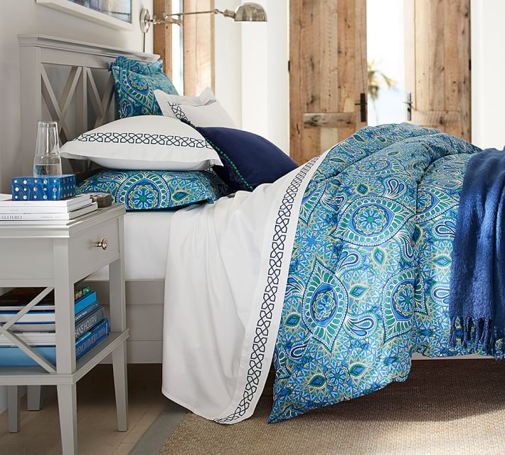 Refresh your bedroom with this gorgeous Pottery Barn bed and bedding.