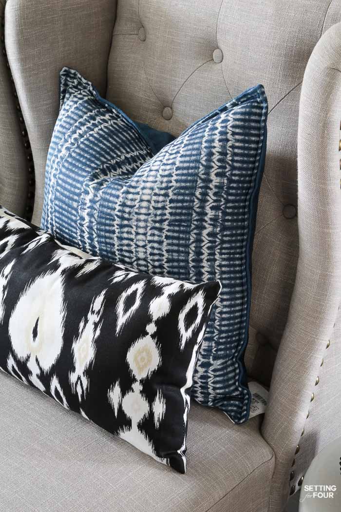 Summer home tour and summer decorating ideas. Foyer with wingback nailhead chairs, indigo shibori pillows, ikat pillows.