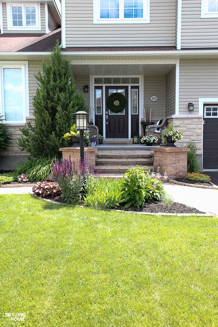 How to create a flower bed around a lamp post to disguise it and pretty it up!