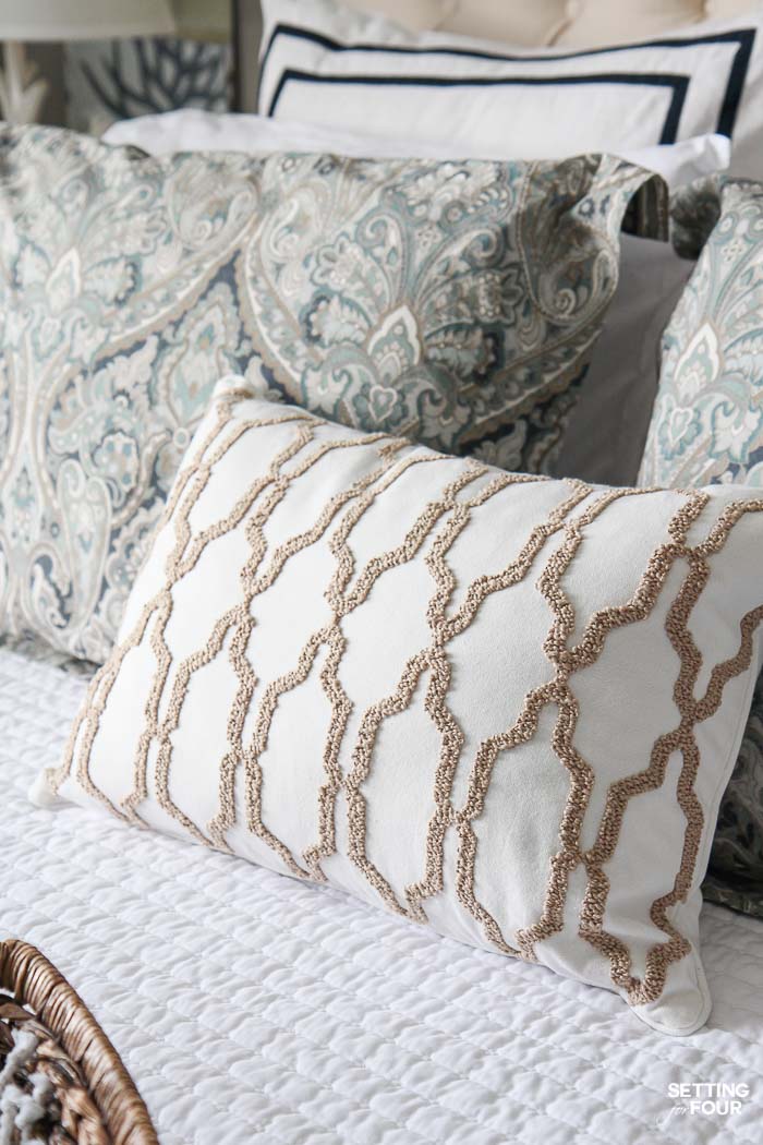 See the 12 ways to create a COZY guest bedroom your company will LOVE! : Add a decorative accent pillow or two.