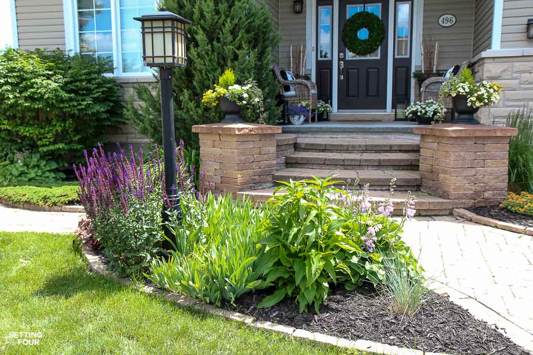 How to add curb appeal to a lamp post and blend it into the yard. See the amazing landscaping ideas and tips!