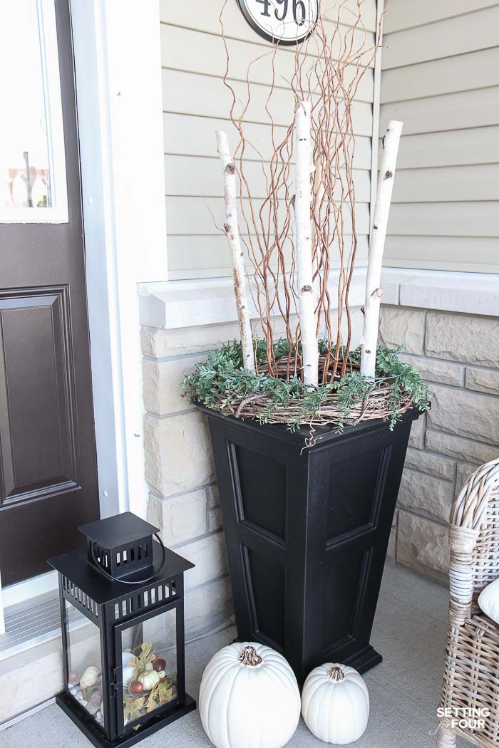 Fall porch decorating ideas: Make these beautiful planters with birch poles and curly willow for a simple rustic look. See how!