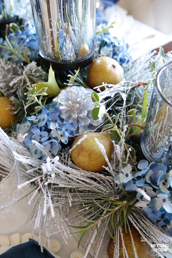 This quick and easy transitional Thanksgiving to Christmas DIY Centerpiece only takes 10 minutes to make! This is such an elegant DIY decor idea  - perfect for the Thanksgiving table that you can leave out until Christmas! Includes a FREE printable checklist of mix and match supply ideas so you can create your very own centerpiece that's unique to you! This also makes a stunning hostess gift too!