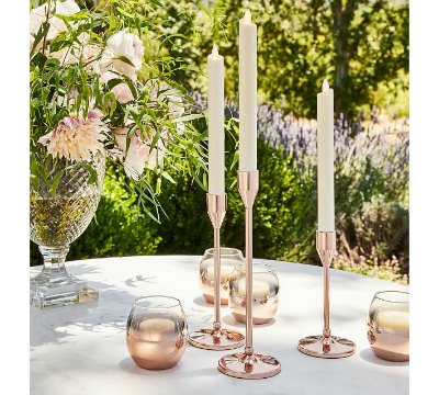 Update your table decor instantly with these gorgeous Rose Gold Candlesticks with a updated modern style!