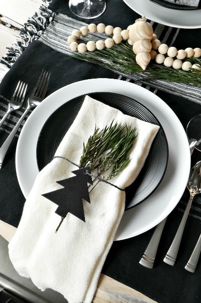 Love this! See how to create this beautiful Christmas Scandinavian Inspired Table! Easy DIY entertaining idea for the home.