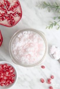 This DIY Vanilla, Pomegranate and Coconut Sugar Scrub Recipe is quick to make and smells amazing Great homemade gift idea! Rich, moisturizing coconut oil mixed with exfoliating sugar not only feels fabulous but gets rid of flaky skin in a jiffy! Click to see the ingredients and directions to make this easy DIY sugar scrub!