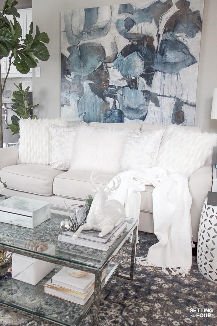 Christmas White and Glam Home Tour - see my holiday home and living room! Faux fur pillows and Christmas glitter deer decor.