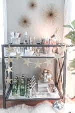 Bar Carts and New Year's Eve Parties go hand in hand! Learn how to create a fun New Years Eve Bar Cart with festive party supplies, delicious food and bubbly drinks! Celebrate the New Year in style!