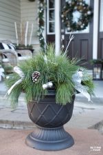 Gorgeous Christmas DIY Decor Idea! In just a few minutes you can put together this Quick and Easy Outdoor Christmas Planter for your front door area or porch! This holiday decorating idea is so easy - even if you aren't a decorator!