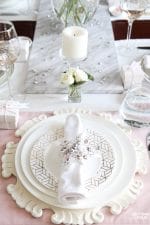 Blush Pink Valentines Day Table Decorations: Want to decorate your table for Valentine's Day but not sure where to start or you want to try something new? Take a look at this lovely Blush Pink Valentine’s Day Table Decor! Read this step by step diy decor lesson - you’ll learn how to set and decorate a lovely blush pink table for a dinner party or party of two, so you can copy it in your home! Celebrate Valentine’s Day with these lovely entertaining tips including ideas for dish ware, flatware, glassware, a pretty rose centerpiece idea, and fun Valentines Day take-home gift ideas for your guests! These table decor ideas would also be perfect for a Valentine's Day wedding reception or bridal shower!